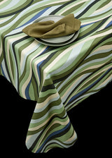 Linen rectangular tablecloth with an organic, undulating pattern in blue, green and ivory hues.
